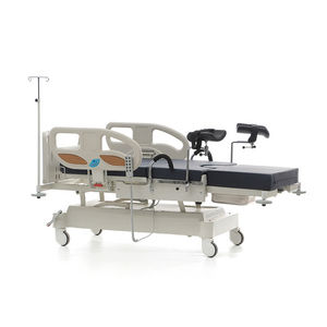 fauteuil d'examen gynécologique / électrique / à hauteur variable / sur roulettes