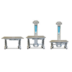 table de radiographie à hauteur variable / avec bras porte-tube