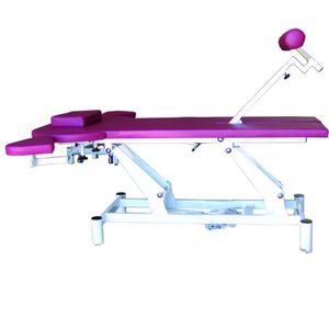 table de traction lombaire