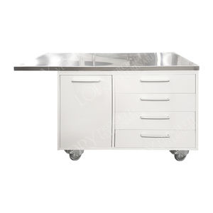 table d'examen vétérinaire / à hauteur fixe / sur roulettes / avec espace de rangement