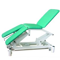 Table de massage électrique / sur roulettes...