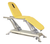 Table de massage électrique / sur roulettes...