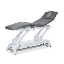 Table de massage électrique / sur roulettes...