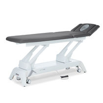 Table de massage électrique / sur roulettes...