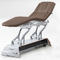 Table de massage électrique / sur roulettes...