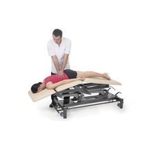 Table de massage électrique / sur roulettes...