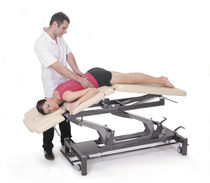 Table de massage électrique / sur roulettes...