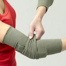 bandage de maintien du coude / avec coussinet ulnaire