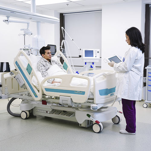 Lit d'hôpital - Jiangsu Saikang Medical Equipment - électrique / à hauteur réglable / sur roulettes